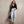 Load image into Gallery viewer, Woman wearing the Ambitionist Button Up Ribbed Henley Bodysuit in black
