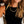Load image into Gallery viewer, Ambitionist High Neck Tank in black styled with gold chain and cream knit
